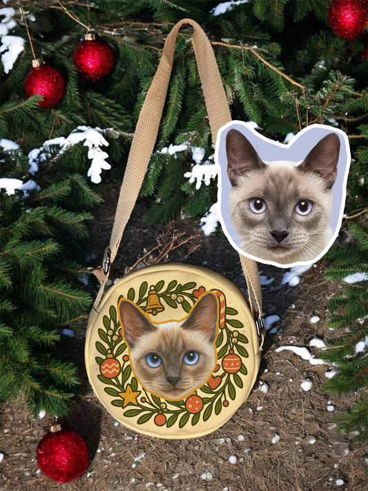 Hand-drawn custom pet portrait canvas bag hanging on Christmas tree, featuring cat artwork with festive ornaments – Bittersweet Illustration