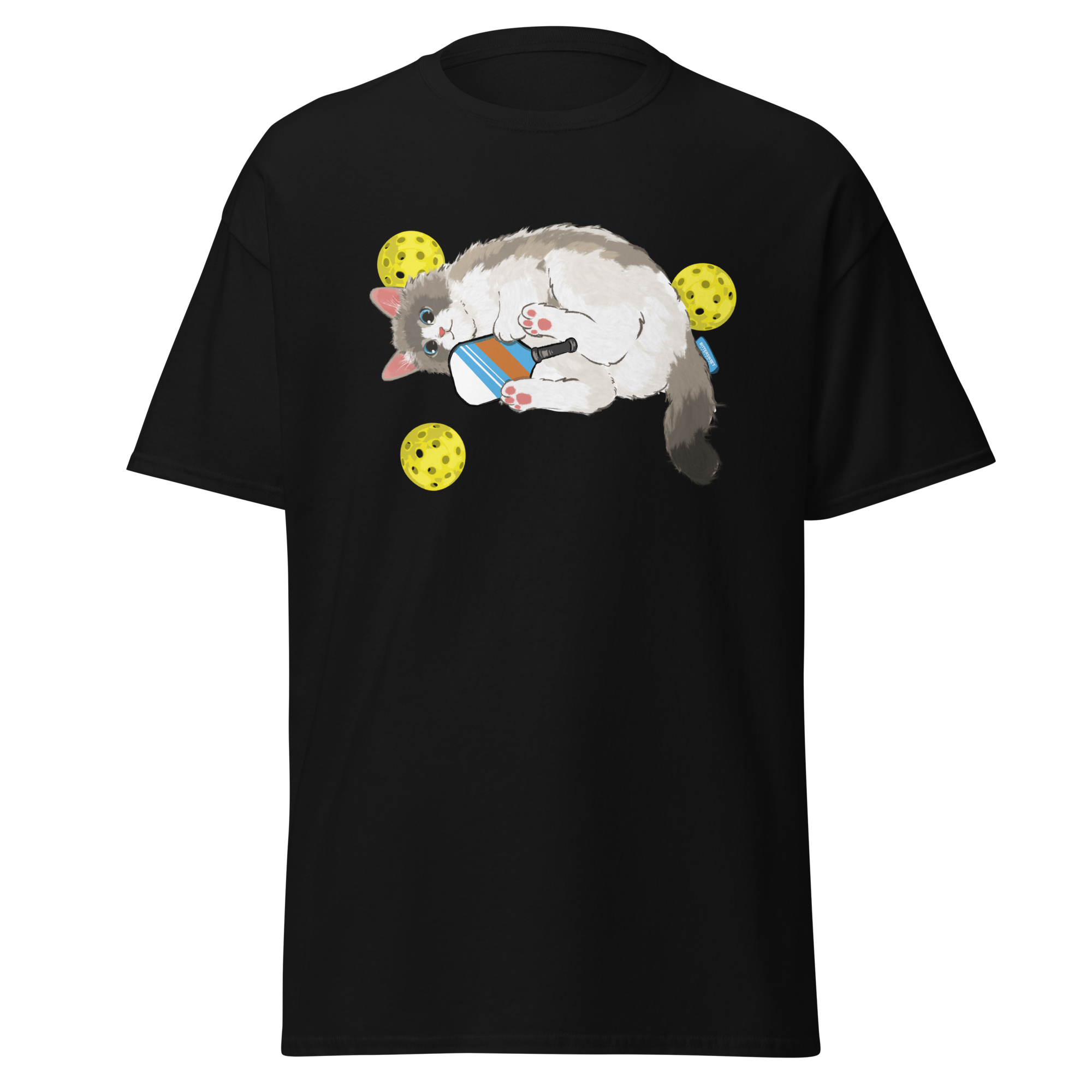 Black pickleball cat graphic t-shirt on flat lay by Bittersweet Illustration, unisex sporty comfort tee